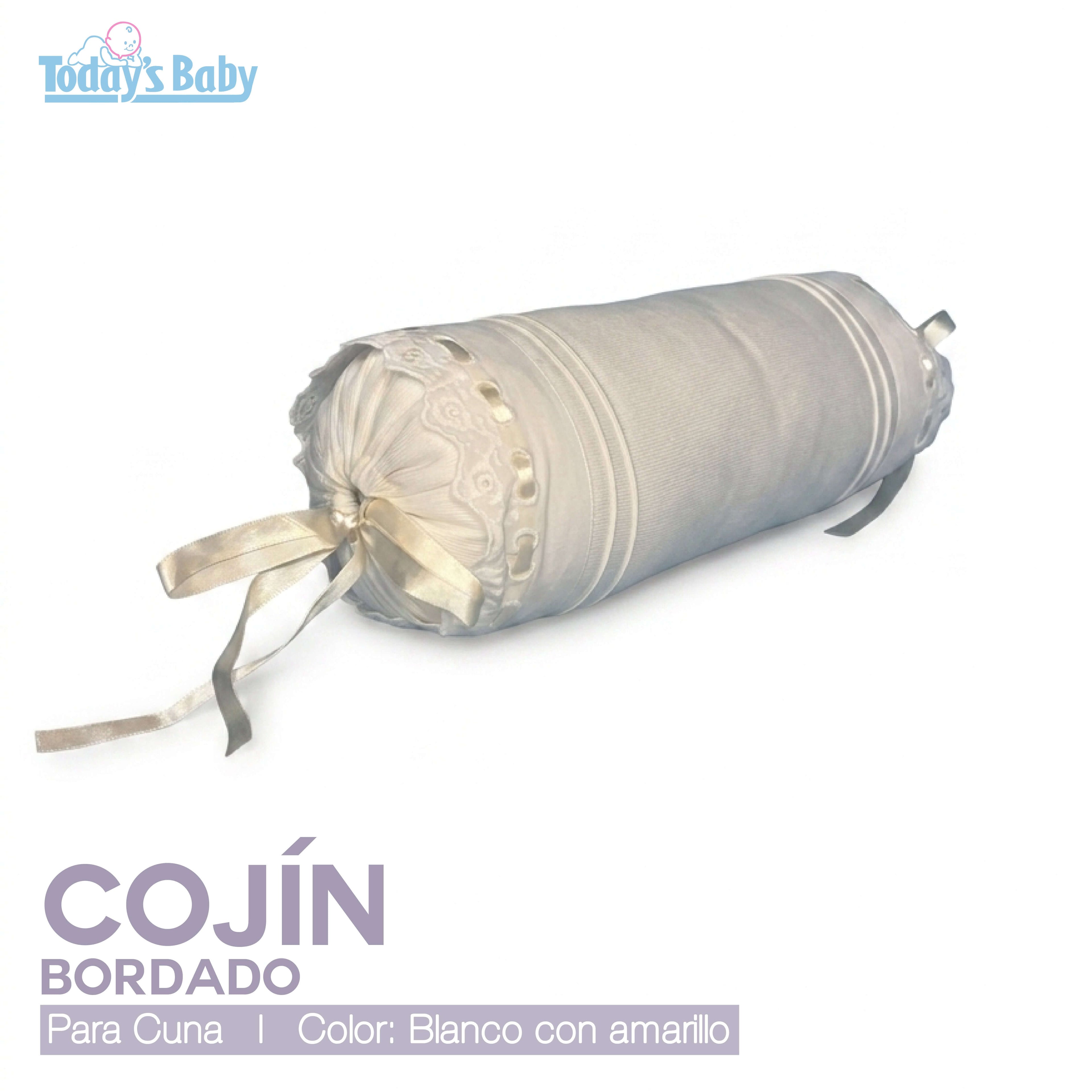 Cojín cilíndrico bordado cuna blanco beige en color blanco con beige, ideal para decorar la cuna.