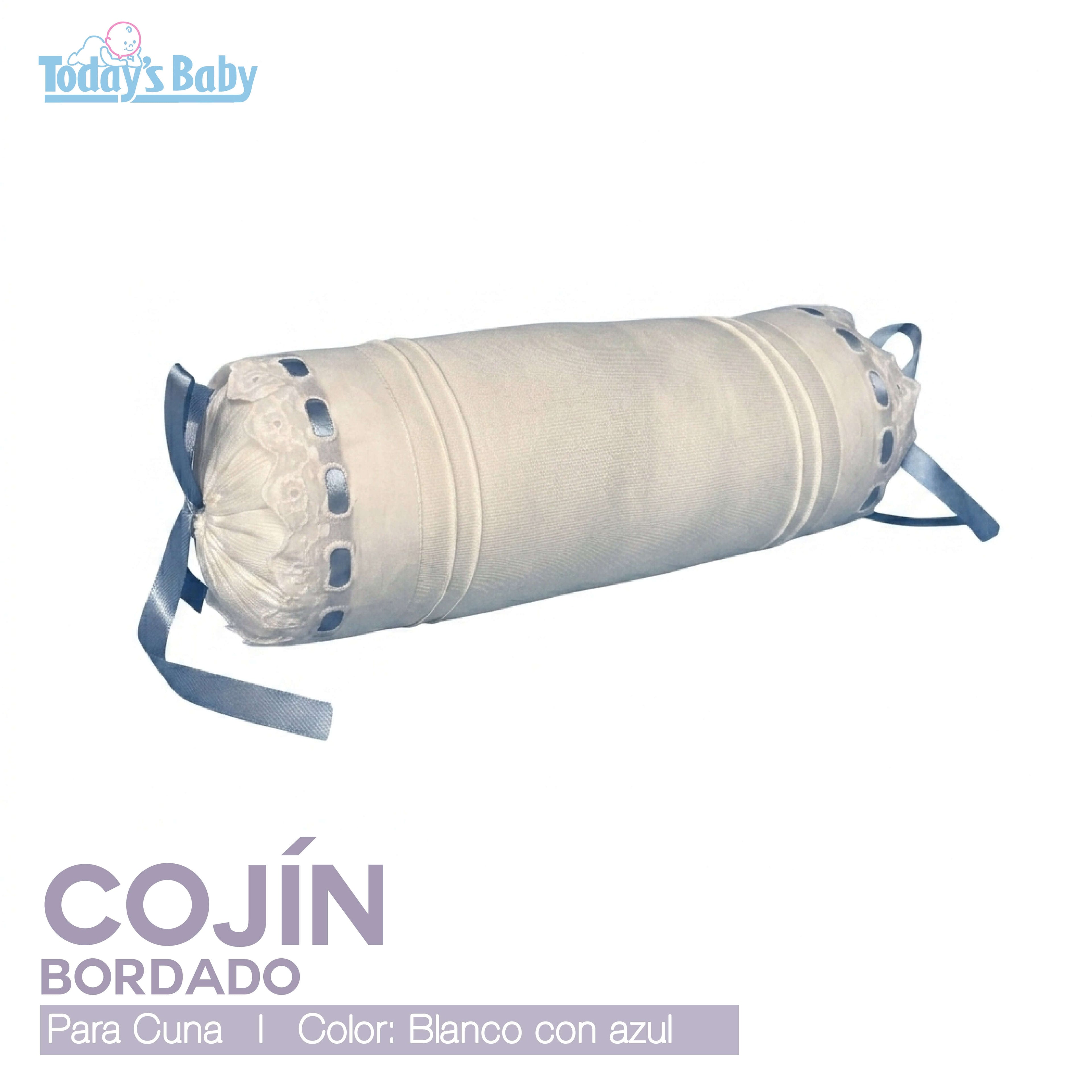 Cojín cilíndrico bordado cuna blanco azul con diseño elegante para el descanso del bebé.
